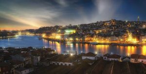 Which is better to visit Porto or Lisbon?